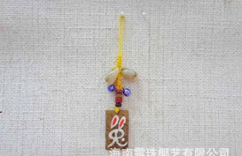 海南特色生肖椰雕手機(jī)掛飾廠家直銷批發(fā)